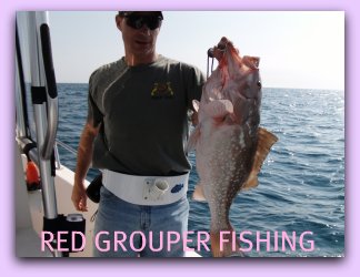 Angler Jay with his 12 pound Red Grouper caught on a 3/4 day Fat Cat Fishing charters.